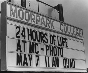 Sign for 24 hours of life at MC-Photo event.
